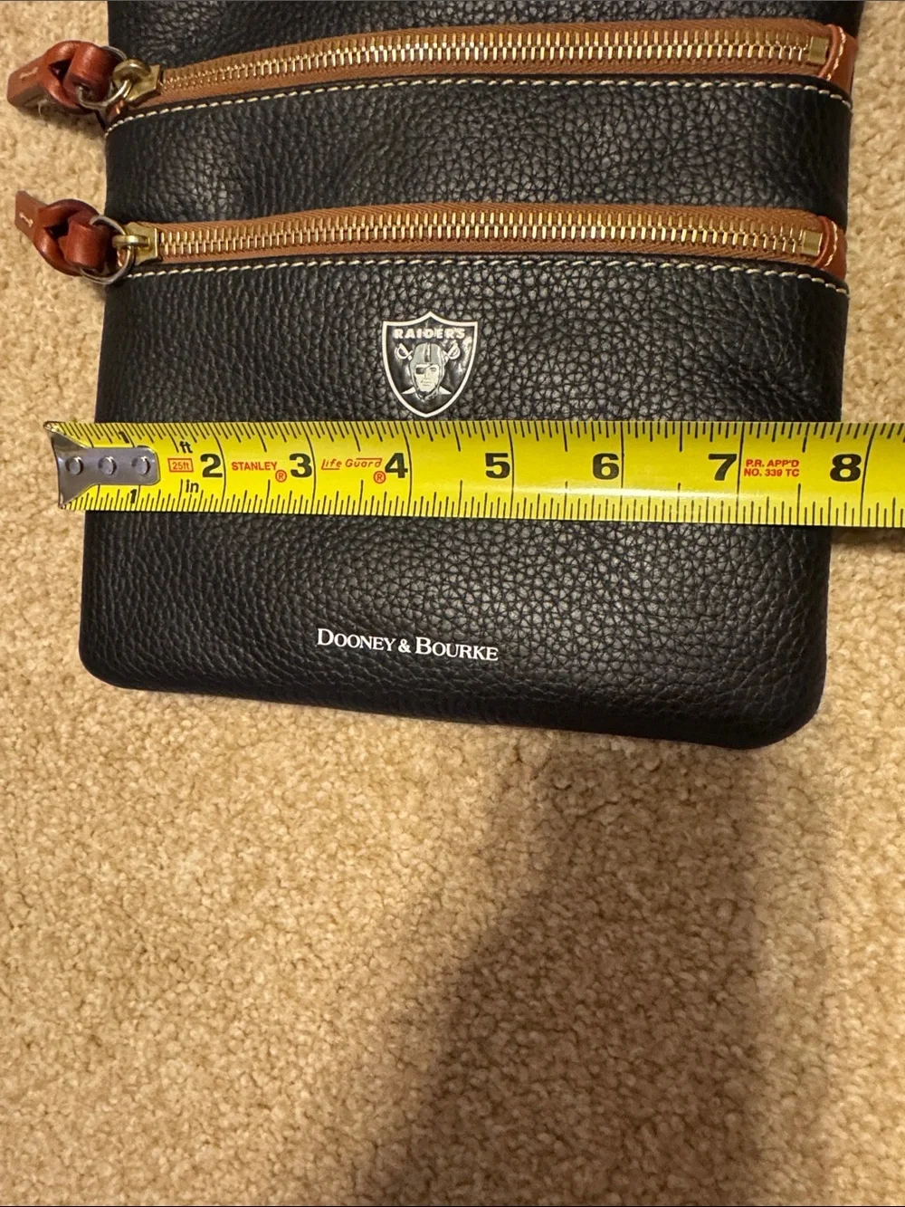 Dooney & Bourke Black Leather Raiders Crossbody with Brown Trim